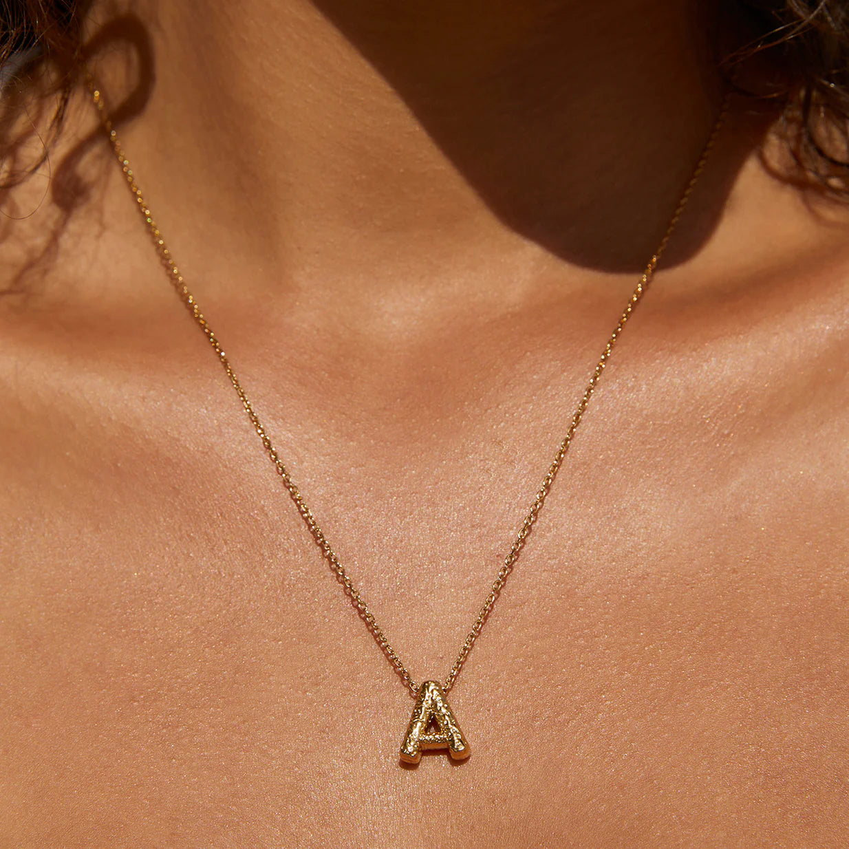 Arms of Eve Statement Letter Necklace GOLD