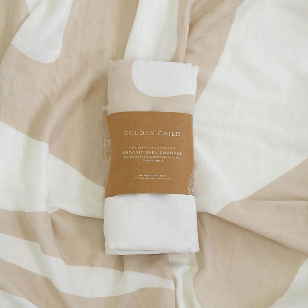 GOLDEN CHILD Holiday Swaddle DREAMY TAUPE