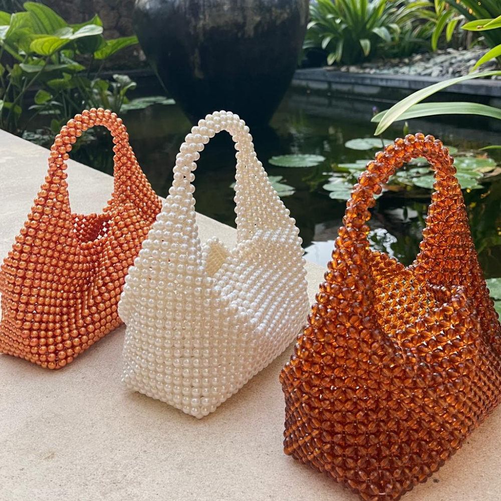 ISLAND TRADERS Canggu Clutch ROSE GOLD