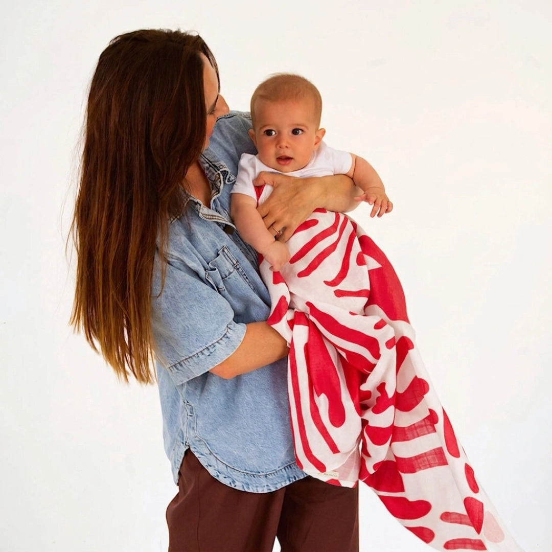 GOLDEN CHILD Holiday Swaddle RED + MILK