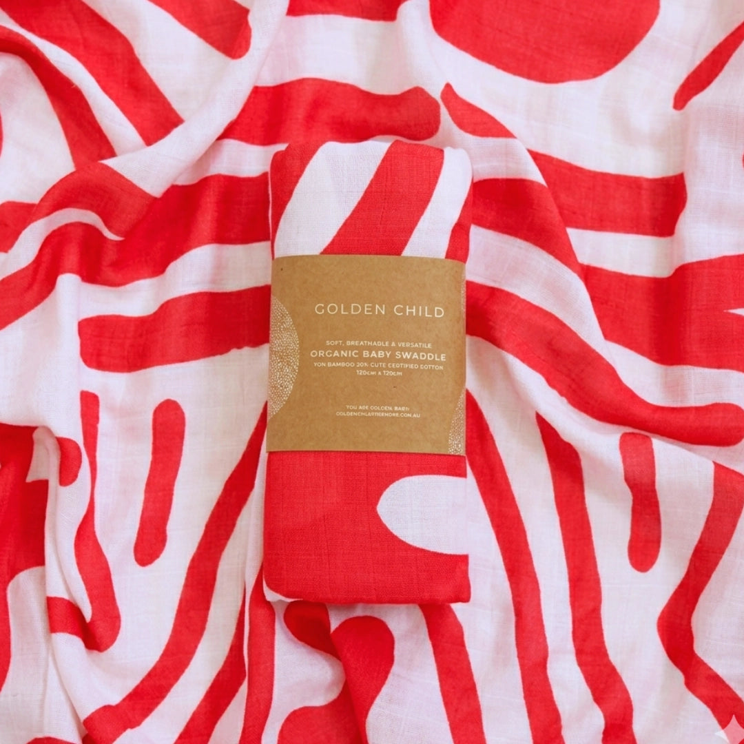GOLDEN CHILD Holiday Swaddle RED + MILK