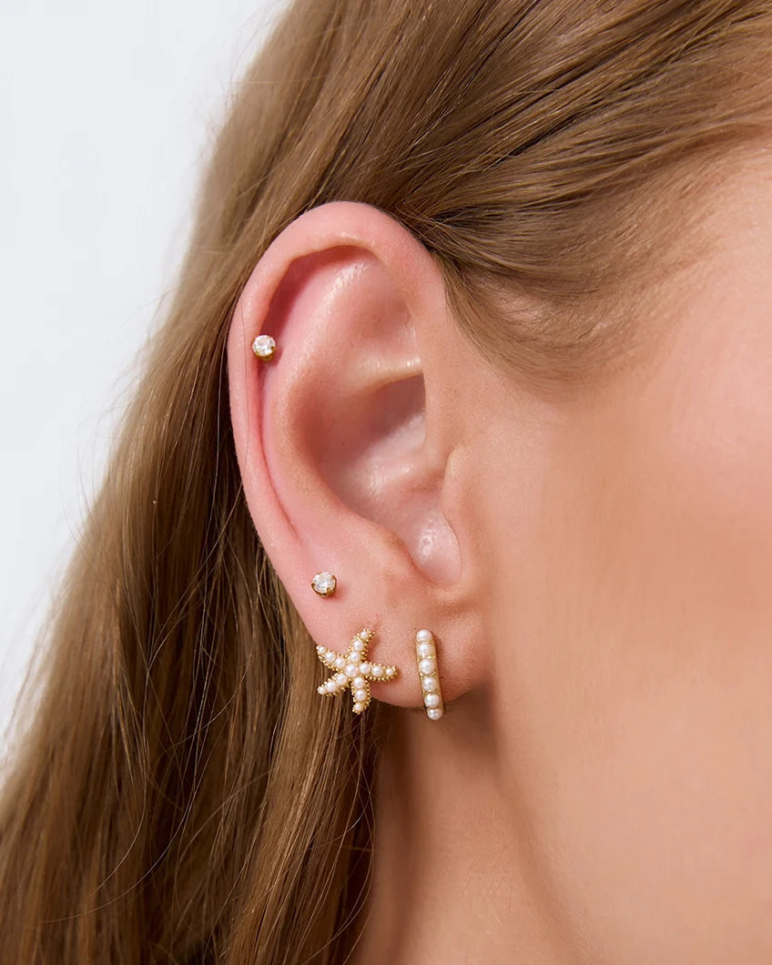 Arms of Eve Presley Huggies GOLD